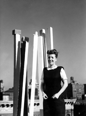 Louise Bourgeois with her sculpture THE VISITORS ARRIVE AT&nbsp;THE
DOOR&nbsp;on the roof of her apartment building, Stuyvesant&#39;s Folly&nbsp;at
142 East 18th Street,&nbsp;circa 1944.&nbsp;Photo: &copy; The Easton Foundation

&nbsp;

&nbsp;
